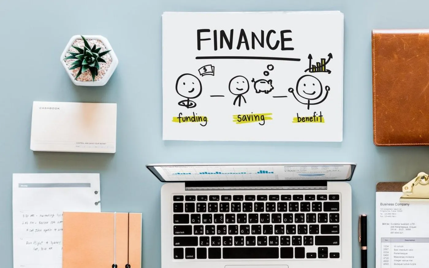 Finance concept displayed on a laptop screen, featuring graphs and charts related to financial analysis and planning.